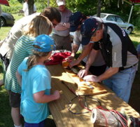 Measuring Jenna Kip's fish: proved good enough for her to place 4th in the Junior Division. (2008)